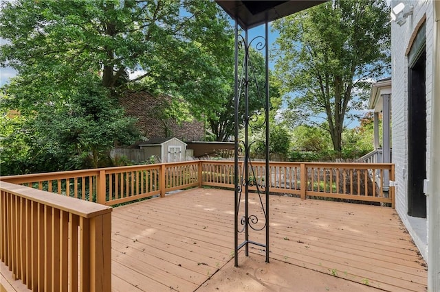 515 Peebles St, Wilkinsburg, PA 15221 - wooden terrace featuring a storage shed and a fenced backyard