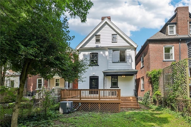 515 Peebles St, Wilkinsburg, PA 15221 - back of house with a chimney, a deck, and brick siding