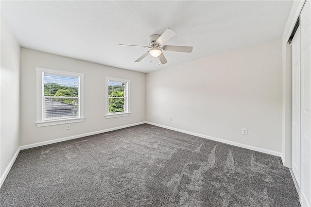 604 N 4th St, Jeannette, PA 15644 - unfurnished room featuring dark carpet and ceiling fan