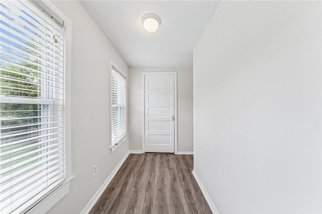 604 N 4th St, Jeannette, PA 15644 - hallway with dark wood-type flooring and baseboards
