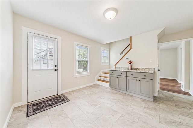 604 N 4th St, Jeannette, PA 15644 - entryway featuring stairway and baseboards