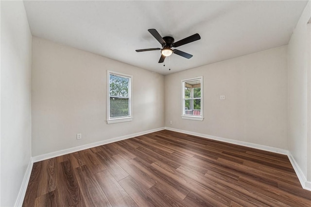 604 N 4th St, Jeannette, PA 15644 - empty room with dark wood-style floors and a ceiling fan