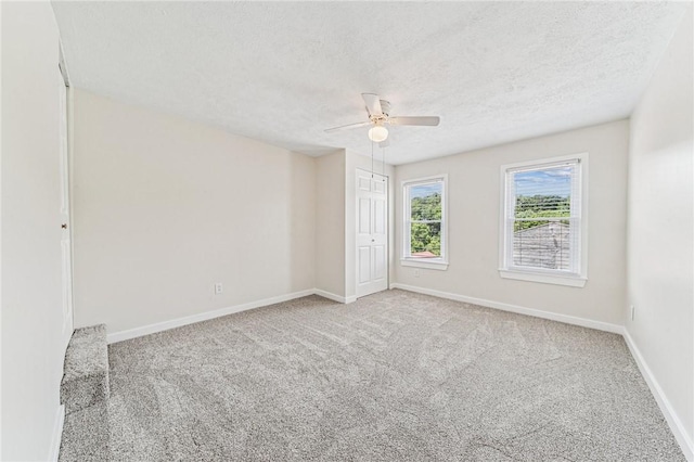 604 N 4th St, Jeannette, PA 15644 - carpeted spare room featuring a ceiling fan and a textured ceiling
