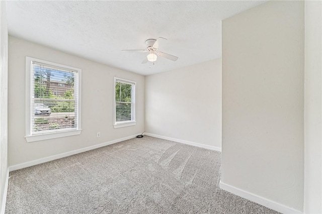 604 N 4th St, Jeannette, PA 15644 - carpeted empty room featuring baseboards and a ceiling fan