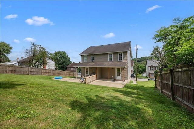 26-28 Clopper St, Sewickley Twp, PA 15637 - rear view of house with a patio and a fenced backyard