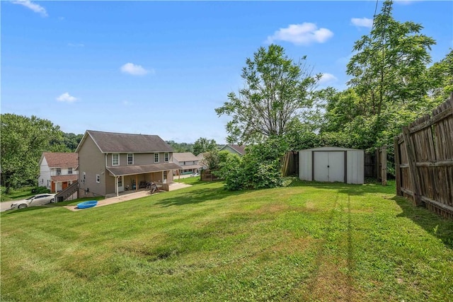 26-28 Clopper St, Sewickley Twp, PA 15637 - fenced backyard featuring a shed and a patio area