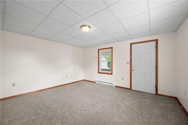 26-28 Clopper St, Sewickley Twp, PA 15637 - unfurnished room with baseboard heating, carpet flooring, and a paneled ceiling