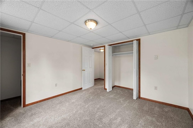 26-28 Clopper St, Sewickley Twp, PA 15637 - unfurnished bedroom featuring carpet, a paneled ceiling, and a closet