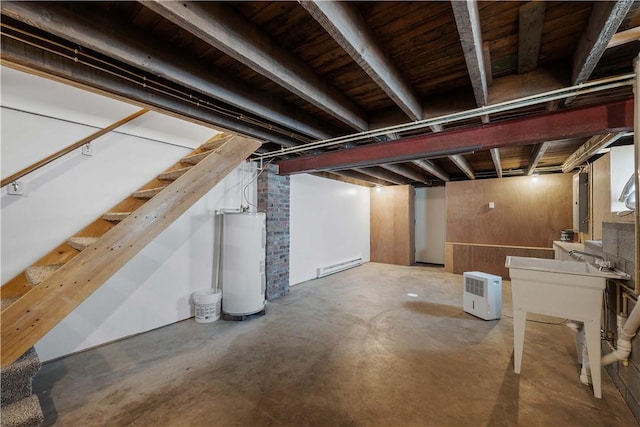 26-28 Clopper St, Sewickley Twp, PA 15637 - finished basement with water heater, stairway, a baseboard heating unit, and wooden ceiling