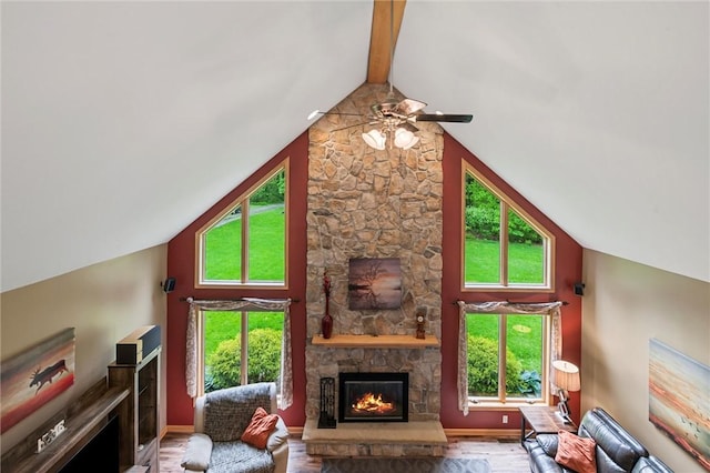 94 Troutman Rd, Pa, PA 16148 - living room with high vaulted ceiling, a fireplace, healthy amount of natural light, ceiling fan, and wood finished floors