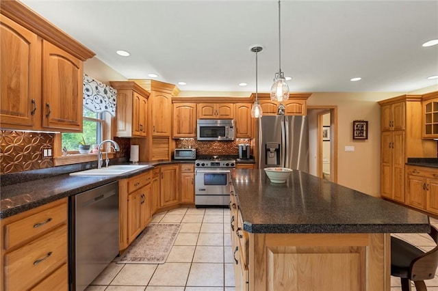 94 Troutman Rd, Pa, PA 16148 - kitchen featuring stainless steel appliances, backsplash, light tile patterned floors, a breakfast bar area, and a kitchen island
