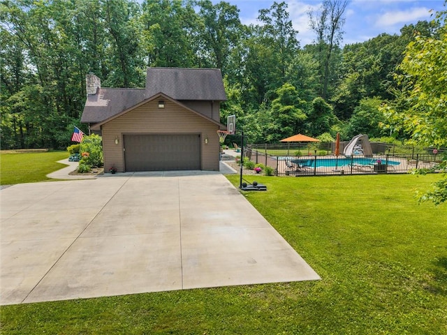 94 Troutman Rd, Pa, PA 16148 - view of front facade featuring a chimney and an attached garage