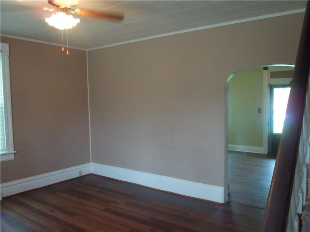 129-131 4th Ave, Scottdale, PA 15683 - empty room featuring arched walkways, wood finished floors, crown molding, and a ceiling fan