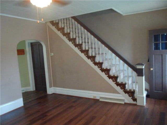 129-131 4th Ave, Scottdale, PA 15683 - stairway with arched walkways, wood finished floors, ornamental molding, and a ceiling fan
