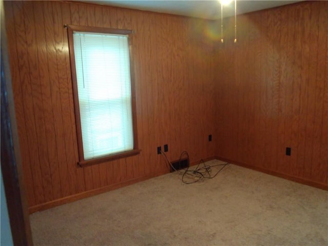 129-131 4th Ave, Scottdale, PA 15683 - carpeted spare room with wooden walls