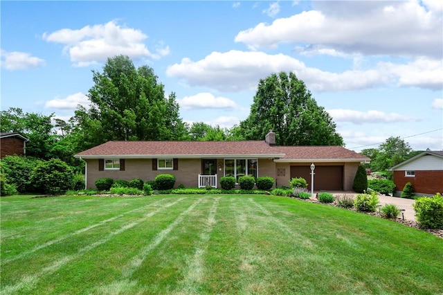 220 N Dr, Center Twp But, PA 16001 - single story home featuring an attached garage, a front lawn, driveway, and a chimney