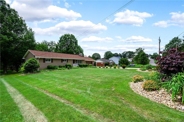 220 N Dr, Center Twp But, PA 16001 - view of green lawn featuring an attached garage