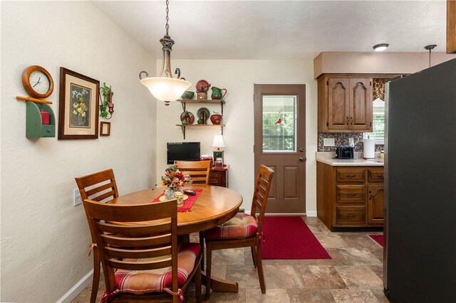 220 N Dr, Center Twp But, PA 16001 - dining area featuring baseboards and stone finish flooring