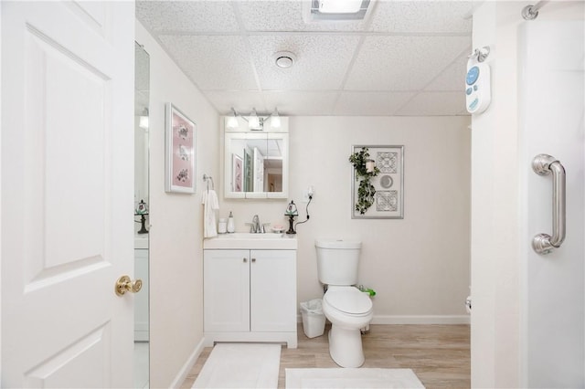 220 N Dr, Center Twp But, PA 16001 - bathroom featuring a paneled ceiling, vanity, and wood finished floors