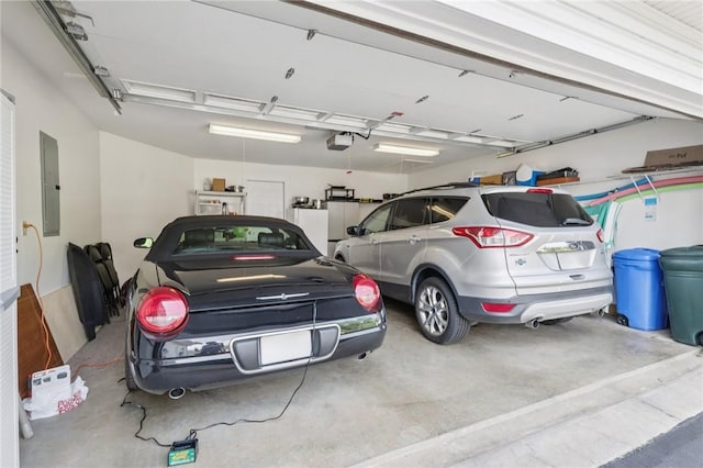 5111 Hemlock, Murrysville, PA 15668 - garage with a garage door opener and electric panel