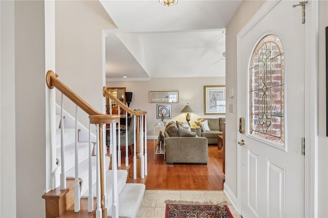 5111 Hemlock, Murrysville, PA 15668 - entrance foyer with tile patterned flooring, stairs, and ceiling fan