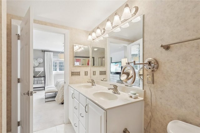 5111 Hemlock, Murrysville, PA 15668 - ensuite bathroom with double vanity and tile patterned flooring