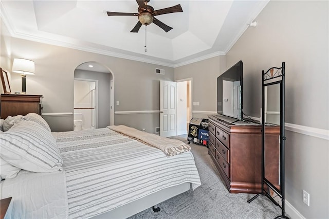 222 Adams Pointe Blvd Unit 1, Adams Twp, PA 16046 - bedroom with a tray ceiling, light colored carpet, arched walkways, ornamental molding, and ensuite bathroom