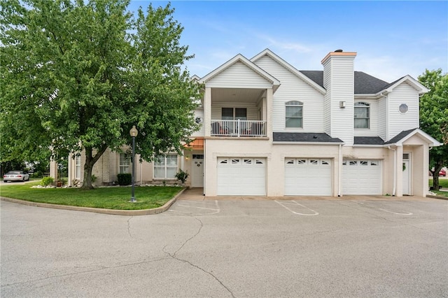 222 Adams Pointe Blvd Unit 1, Adams Twp, PA 16046 - multi unit property featuring a balcony, an attached garage, a chimney, driveway, and a shingled roof