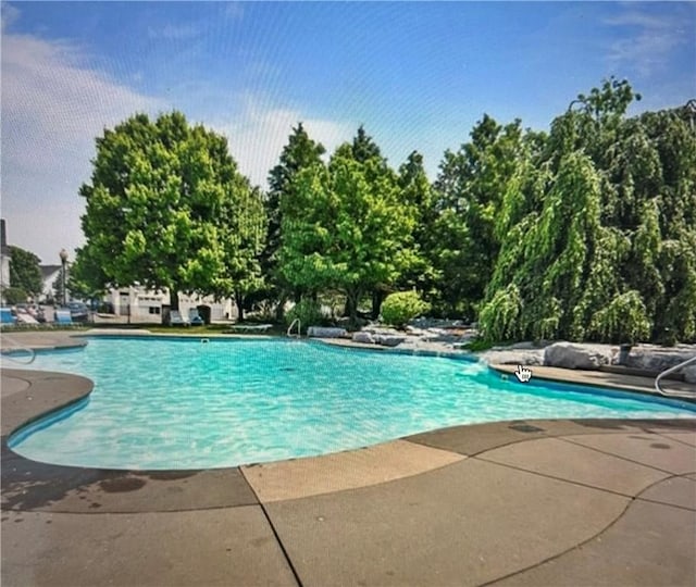 222 Adams Pointe Blvd Unit 1, Adams Twp, PA 16046 - community pool featuring a patio area
