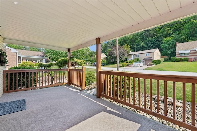 991 Diane Dr N, Versailles, PA 15137 - covered porch featuring a lawn and a residential view