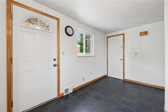 991 Diane Dr N, Versailles, PA 15137 - entrance foyer featuring baseboards and dark tile patterned floors
