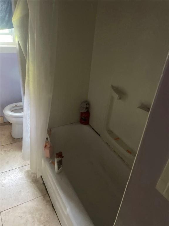 1213 Mccormick Ave, Connellsville, PA 15425 - bathroom with tile patterned flooring and washtub / shower combination