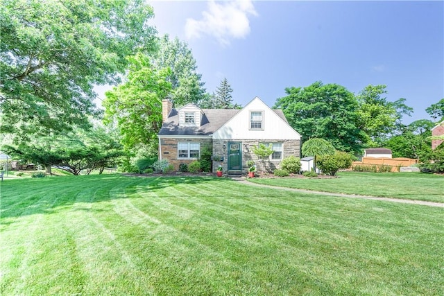 2688 Summit St, Bethel Park, PA 15102 - cape cod house featuring a front lawn, a shed, a chimney, and stone siding