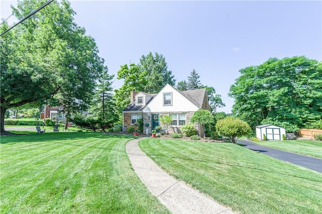 2688 Summit St, Bethel Park, PA 15102 - cape cod home with a storage shed, a front lawn, and a chimney