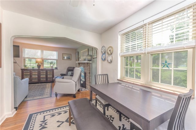2688 Summit St, Bethel Park, PA 15102 - dining area featuring arched walkways and wood finished floors