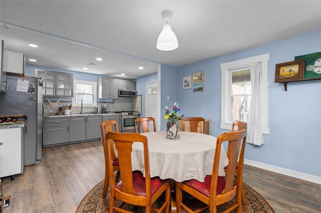 7129 Michigan Ave, Swissvale, PA 15218 - dining space featuring light wood finished floors and recessed lighting