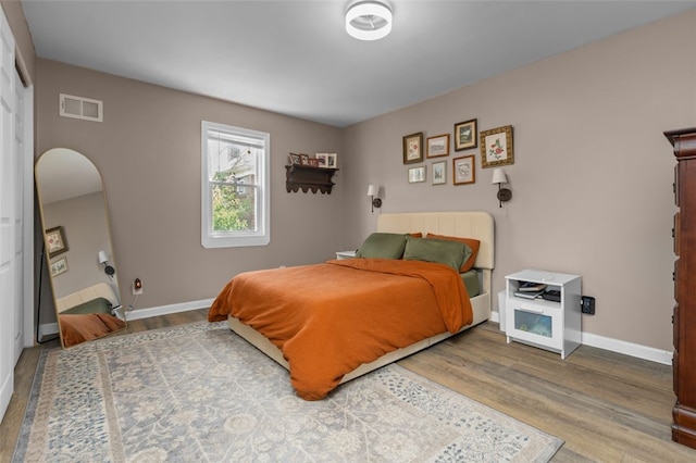 7129 Michigan Ave, Swissvale, PA 15218 - bedroom with wood finished floors and arched walkways