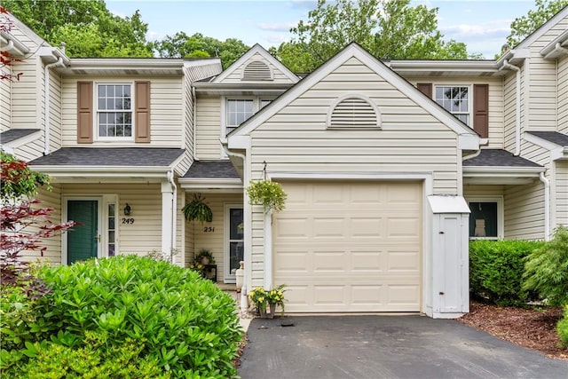 251 Commons Dr, Oakmont, PA 15139 - townhome / multi-family property featuring asphalt driveway, a garage, and a shingled roof