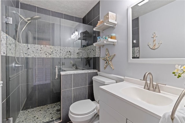 251 Commons Dr, Oakmont, PA 15139 - bathroom with a stall shower, vanity, and a textured ceiling