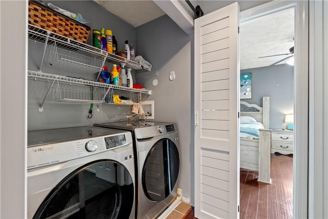 251 Commons Dr, Oakmont, PA 15139 - washroom featuring washing machine and dryer, wood finished floors, and ceiling fan
