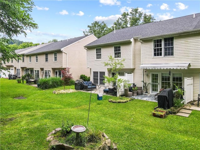 251 Commons Dr, Oakmont, PA 15139 - rear view of house featuring an outdoor hangout area, a patio area, and a yard