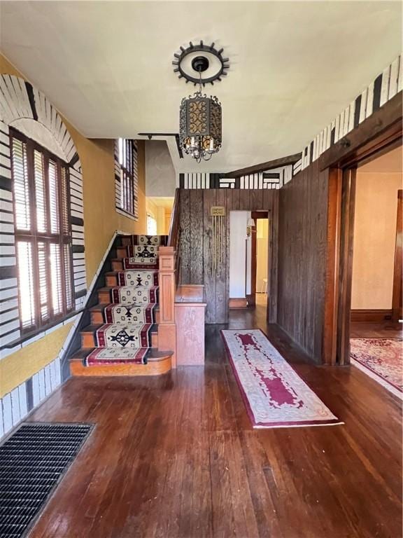 384 E End Ave, Beaver, PA 15009 - unfurnished living room with wood-type flooring and a chandelier
