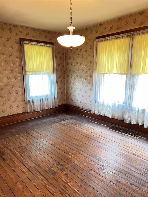 384 E End Ave, Beaver, PA 15009 - empty room featuring wallpapered walls and wood-type flooring
