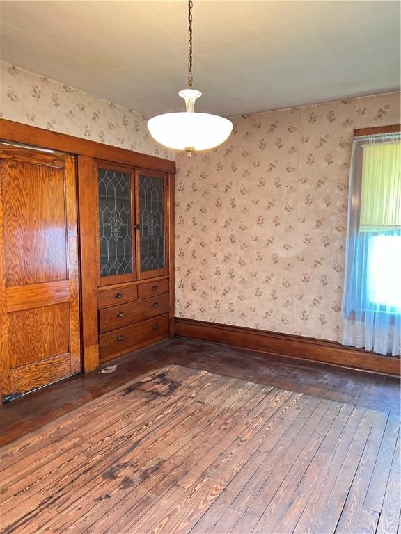 384 E End Ave, Beaver, PA 15009 - spare room featuring wallpapered walls and hardwood / wood-style flooring