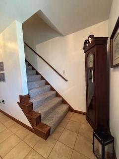 2355 School St, Mount Pleasant Twp Wml, PA 15666 - stairs with tile patterned floors and baseboards