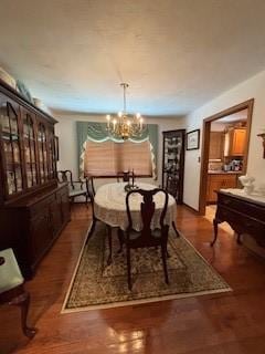 2355 School St, Mount Pleasant Twp Wml, PA 15666 - dining space featuring wood finished floors and a chandelier