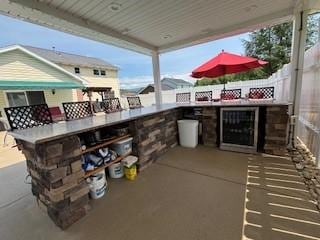 2355 School St, Mount Pleasant Twp Wml, PA 15666 - view of patio featuring beverage cooler and exterior kitchen