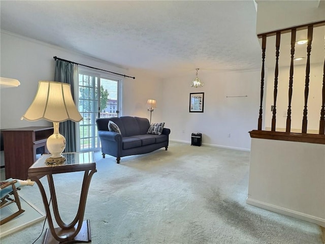 830 S Main St Unit 206, City Of Washington, PA 15301 - living area with carpet, a chandelier, and a textured ceiling