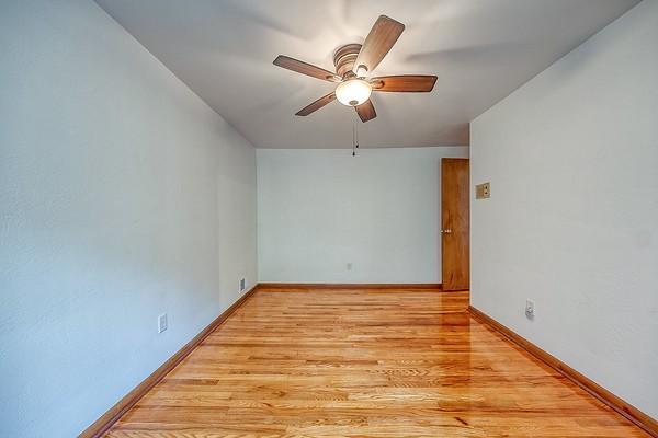 4517 W Brightview Ave, Whitehall, PA 15227 - empty room with a ceiling fan and light wood-style floors