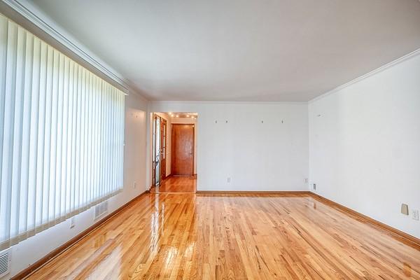 4517 W Brightview Ave, Whitehall, PA 15227 - unfurnished room featuring light wood-style floors and crown molding